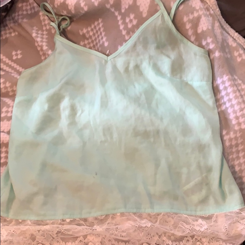Mint colored blouse with lace trim